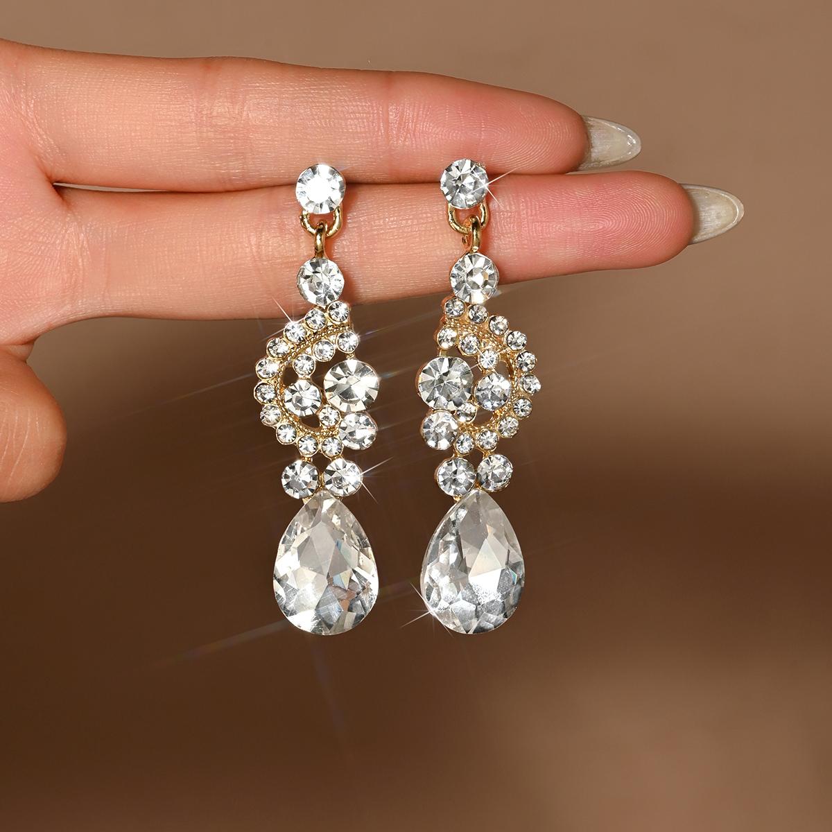 European and American diamond inlaid flower tassel temperament cross-border high-end feeling light luxury earrings for women
European and American diamond inlaid flower tassel temperament cross-border high-end feeling light luxury earrings for women