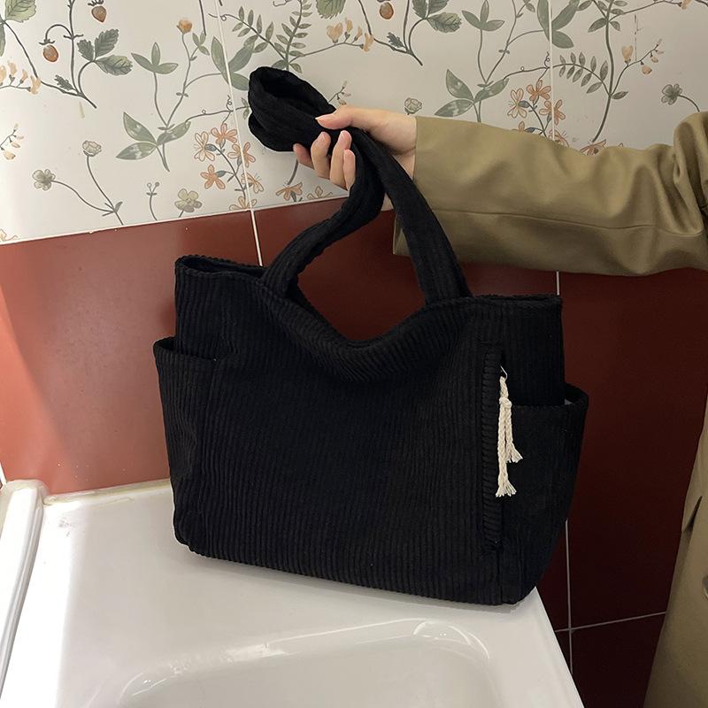 Strip casual new personalized solid color large-capacity tote bag women s new autumn and winter fashion versatile shoulder bag чёрный
Strip casual new personalized solid color large-capacity tote bag women s new autumn and winter fashion versatile shoulder bag чёрный