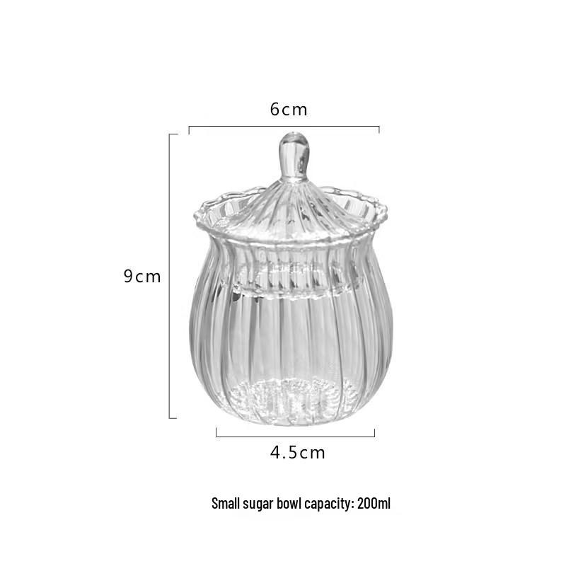 Clear Square Glass Storage Jar for Sugar, Candy, Tea, Coffee Beans, Snacks, and Dried Fruits.
Clear Square Glass Storage Jar for Sugar, Candy, Tea, Coffee Beans, Snacks, and Dried Fruits.