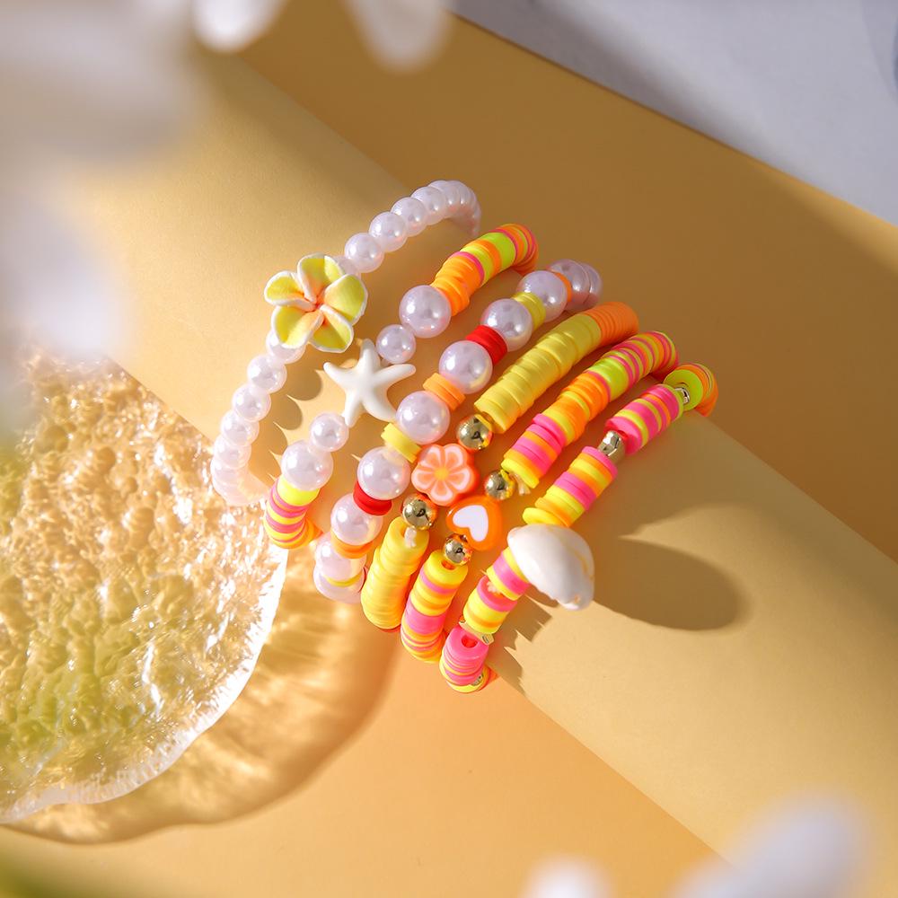Ocean-Themed Polymer Clay Bracelet Set: Five-Petal Flower, Shell, Pearl Charms (6-Piece)
Ocean-Themed Polymer Clay Bracelet Set: Five-Petal Flower, Shell, Pearl Charms (6-Piece)
