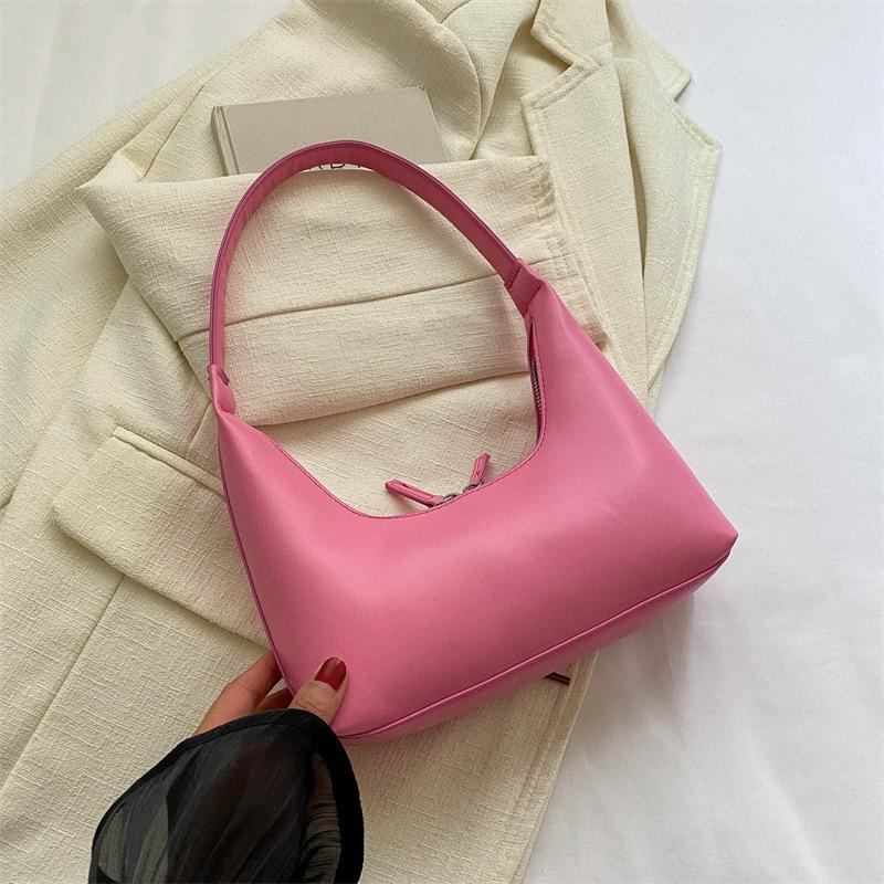 Премиальная текстура, зарубежный стиль и универсальная женская сумка для поездок 2025 новая нишевая однотонная повседневная сумка на одно плечо для ношения в руке маленькая квадратная сумка No pendant розовый