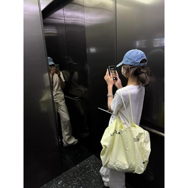 Yellow canvas bag niche bag large capacity commuter shoulder bag simple shopping bag tide жёлтый
Yellow canvas bag niche bag large capacity commuter shoulder bag simple shopping bag tide жёлтый