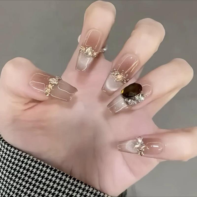 Luxury Handmade Cat Eye Gradient Sparkle False Nails with Diamond Accents for a Radiant Manicure
Luxury Handmade Cat Eye Gradient Sparkle False Nails with Diamond Accents for a Radiant Manicure