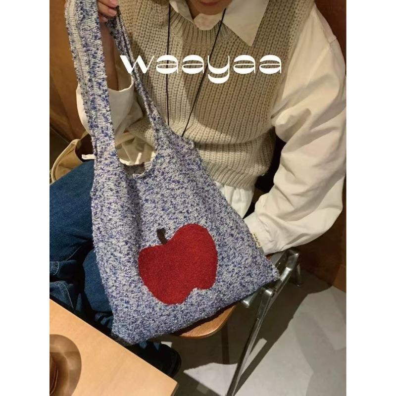 Early spring niche original autumn and winter texture cloth thick thread color apple embroidery shoulder handbag storage casual
Early spring niche original autumn and winter texture cloth thick thread color apple embroidery shoulder handbag storage casual