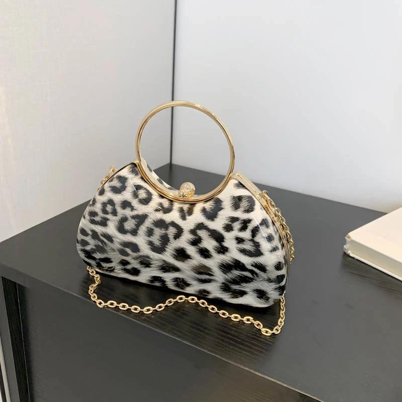 Женские сумки через плечо с цепочкой и верхней ручкой, женские сумки, горячая распродажа, дизайн с крыльями леопарда, роскошный легкий ужин, мода
Женские сумки через плечо с цепочкой и верхней ручкой, женские сумки, горячая распродажа, дизайн с крыльями леопарда, роскошный легкий ужин, мода