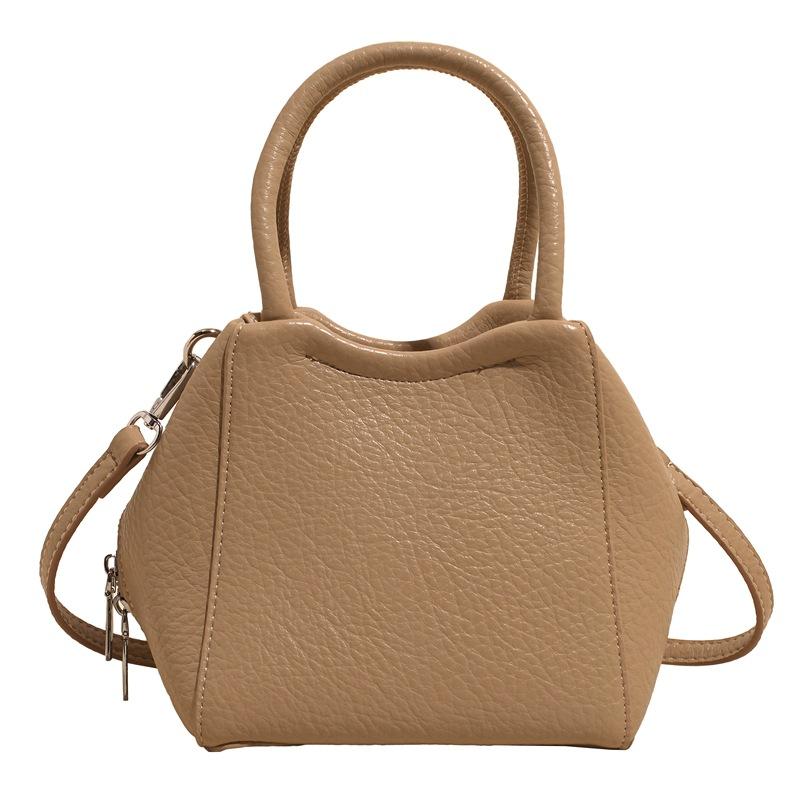 Оптовая мода высокое чувство простой стиль однотонный узор личи сумка-ведро повседневная универсальная сумка-мессенджер для通勤 для женщин
Оптовая мода высокое чувство простой стиль однотонный узор личи сумка-ведро повседневная универсальная сумка-мессенджер для通勤 для женщин