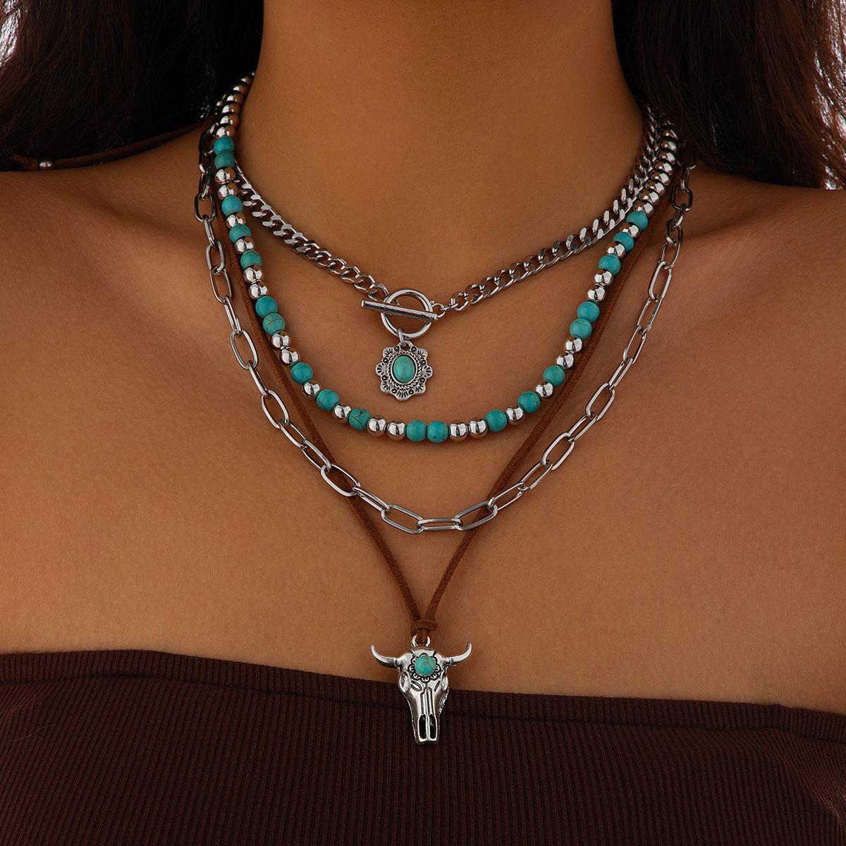 Retro imitation turquoise cow head collarbone necklace, exotic ethnic style cactus stacked with beaded necklace
Retro imitation turquoise cow head collarbone necklace, exotic ethnic style cactus stacked with beaded necklace