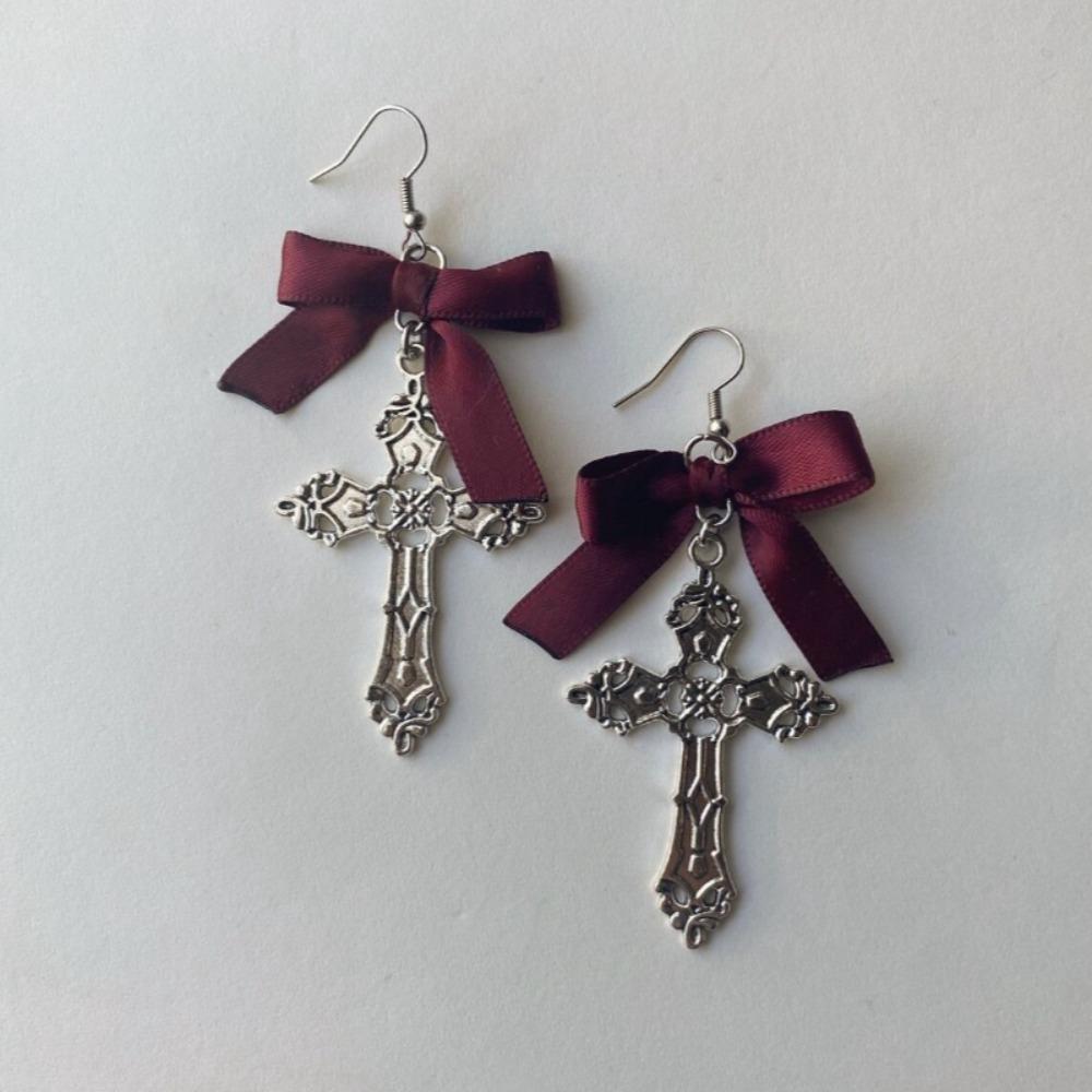 Cute Vintage Dark Red Ribbon Bowknot Ancient Silver Hollowed-out Patterns Cross Charms Dangle Earrings for Woman Gothic Jewelry
Cute Vintage Dark Red Ribbon Bowknot Ancient Silver Hollowed-out Patterns Cross Charms Dangle Earrings for Woman Gothic Jewelry