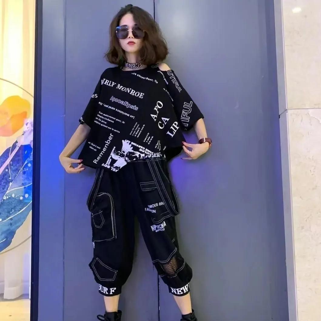 Жіноча літня вільна футболка з коротким рукавом незвичайної форми + Сім штанів з принтом літер, набір з двох предметів L чорний
Жіноча літня вільна футболка з коротким рукавом незвичайної форми + Сім штанів з принтом літер, набір з двох предметів L чорний