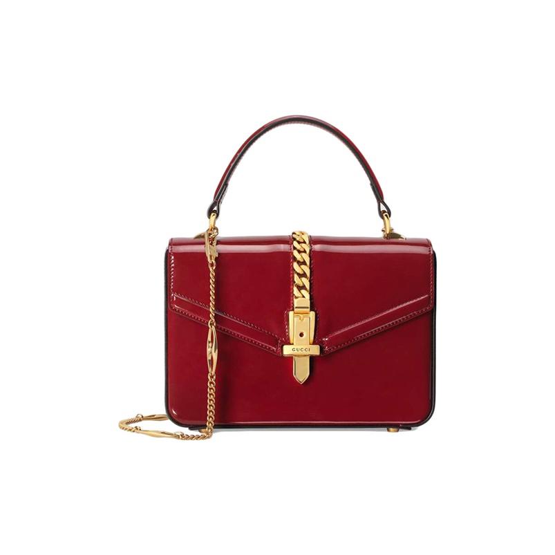 Gucci Sylvie 1969 Red Patent Leather Top Handle Crossbody Bag With Gold Hardware For Women Daily Use Basic Set (Bag+Dust Bag)
Gucci Sylvie 1969 Red Patent Leather Top Handle Crossbody Bag With Gold Hardware For Women Daily Use Basic Set (Bag+Dust Bag)