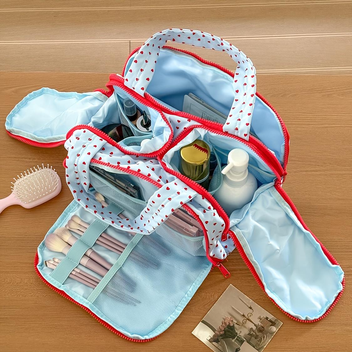 Large-capacity portable toiletry bag, blue with red heart pattern. Ideal for makeup storage and travel, stylish for daily and outdoor use.
Large-capacity portable toiletry bag, blue with red heart pattern. Ideal for makeup storage and travel, stylish for daily and outdoor use.