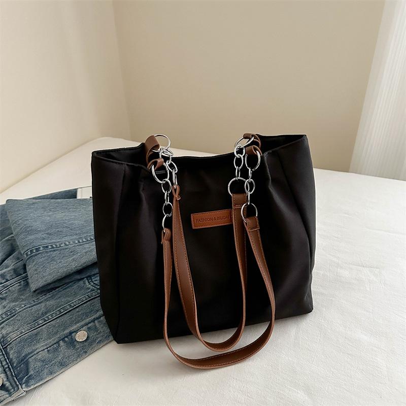 2024 летняя новая трендовая сумка через плечо, простая, большая вместимость, модная сумка для учебы, для студентов колледжа, сумка-тоут для женщин чёрный
2024 летняя новая трендовая сумка через плечо, простая, большая вместимость, модная сумка для учебы, для студентов колледжа, сумка-тоут для женщин чёрный