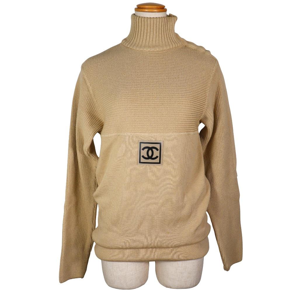 CHANEL High neck sweater knit P19884W03055 02A Sports line COCO Mark beige wool Women Used
CHANEL High neck sweater knit P19884W03055 02A Sports line COCO Mark beige wool Women Used