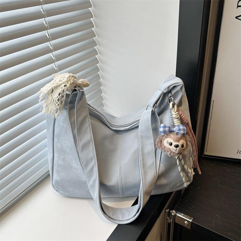 Новый класс студентов-коммутеров большая вместимость повседневная сумка-мессенджер текстура плечевая сумка подмышку женская no pendant синий
Новый класс студентов-коммутеров большая вместимость повседневная сумка-мессенджер текстура плечевая сумка подмышку женская no pendant синий