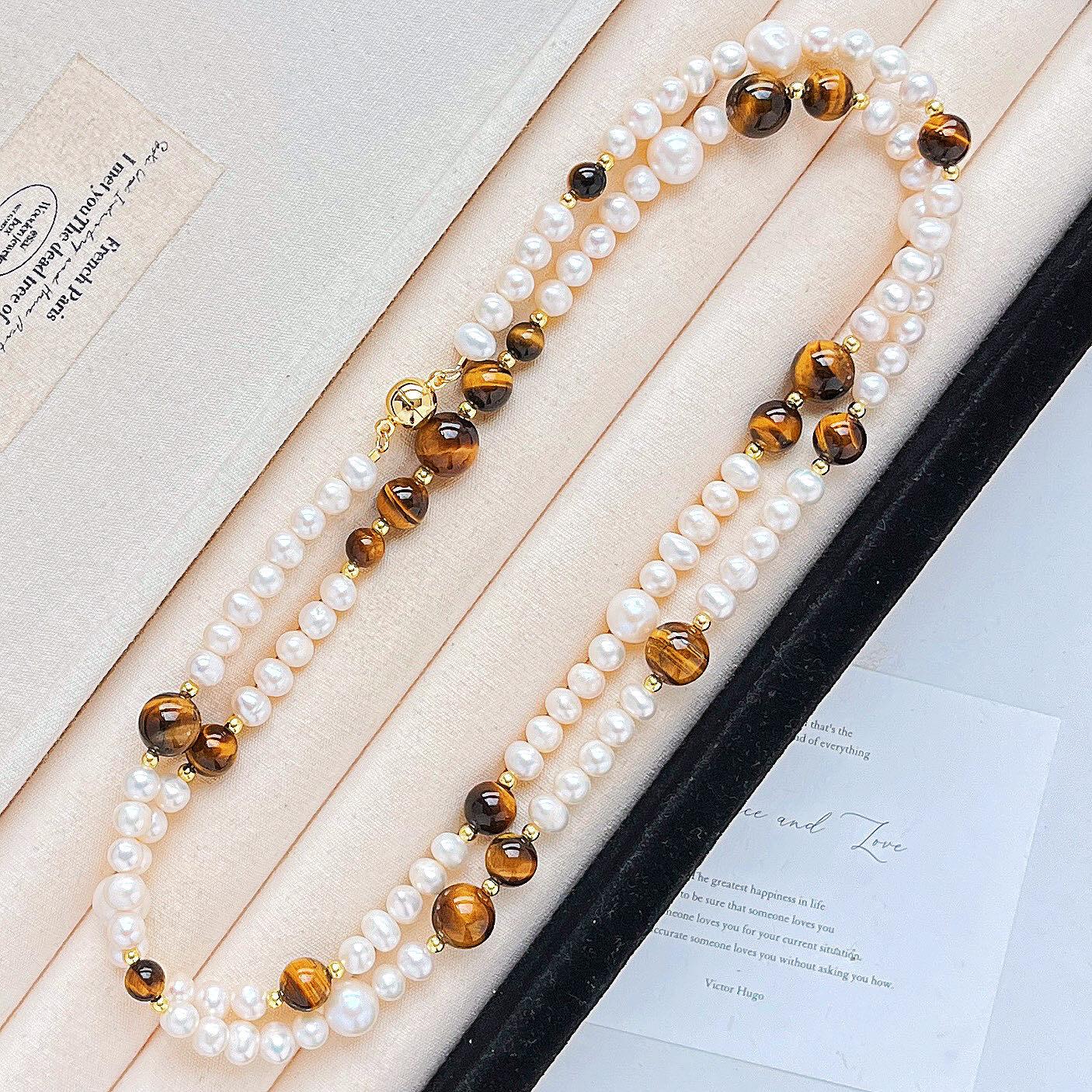 Autumn And Winter Retro Boutique Natural Tiger S Eye Stone Freshwater Pearl Design Sense Necklace Collarbone Chain Sweater Chain Women
Autumn And Winter Retro Boutique Natural Tiger S Eye Stone Freshwater Pearl Design Sense Necklace Collarbone Chain Sweater Chain Women