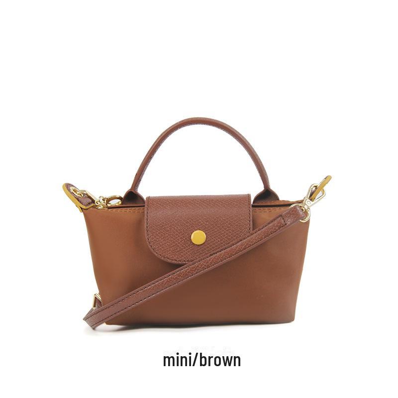 Нейлоновий міні-пакет для пельменів: Жіноча сумка-кроссбоді 2024 року, що носить у руці та через плече Mini
Нейлоновий міні-пакет для пельменів: Жіноча сумка-кроссбоді 2024 року, що носить у руці та через плече Mini