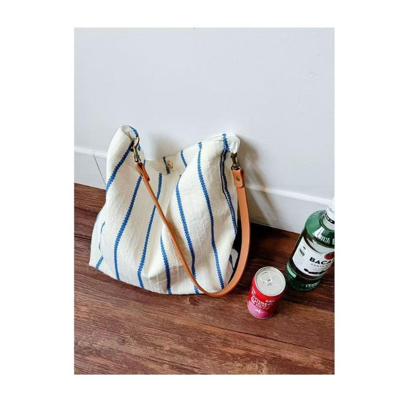 Daydream long original summer jacquard blue striped tote bag niche texture commuter shoulder cloth bag versatile woman
Daydream long original summer jacquard blue striped tote bag niche texture commuter shoulder cloth bag versatile woman