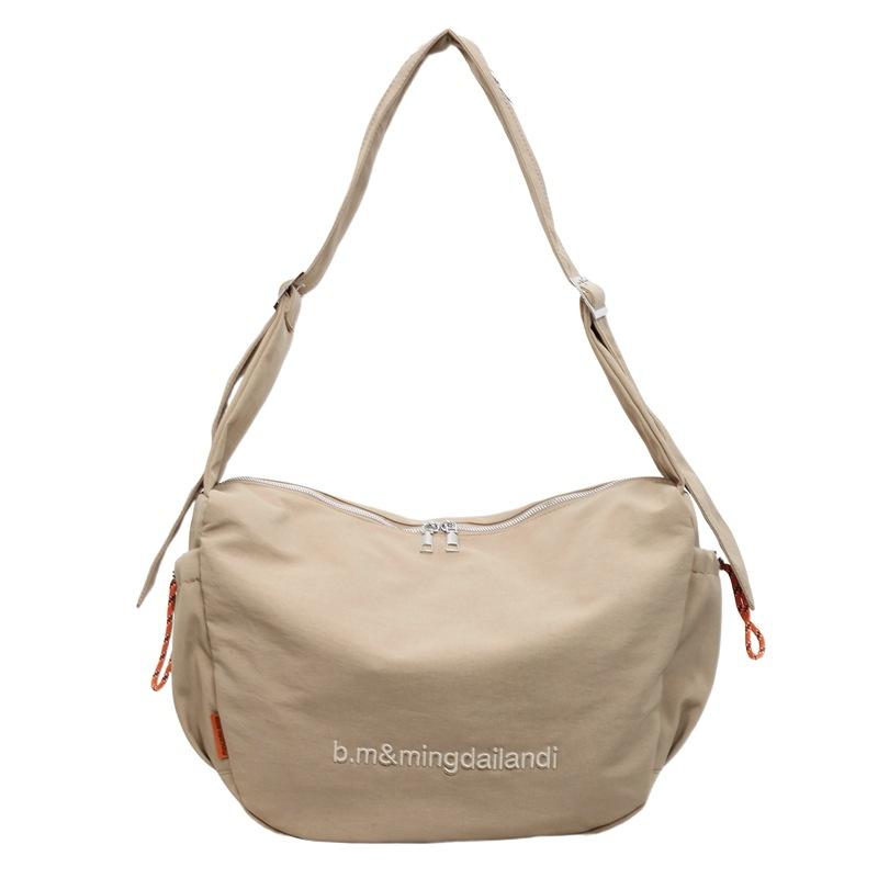Hua er and Xiao have the same dumpling bag, women s leisure commuter messenger bag, large-capacity shoulder bag, men s tooling wind backpack. хаки
Hua er and Xiao have the same dumpling bag, women s leisure commuter messenger bag, large-capacity shoulder bag, men s tooling wind backpack. хаки