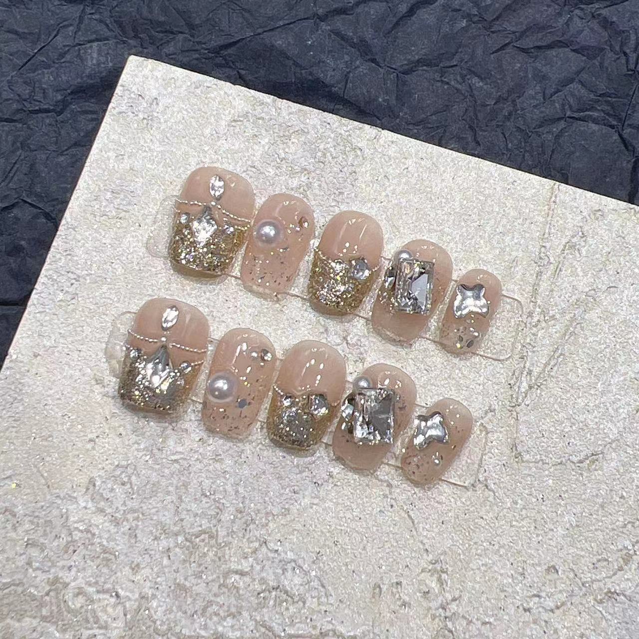 Wearing Nail Handmade Nail Art Finished Fake Nail Patches In Autumn and Winter Light Luxury Style Nude Color Flashing Steel Ball Diamond Large L
Wearing Nail Handmade Nail Art Finished Fake Nail Patches In Autumn and Winter Light Luxury Style Nude Color Flashing Steel Ball Diamond Large L