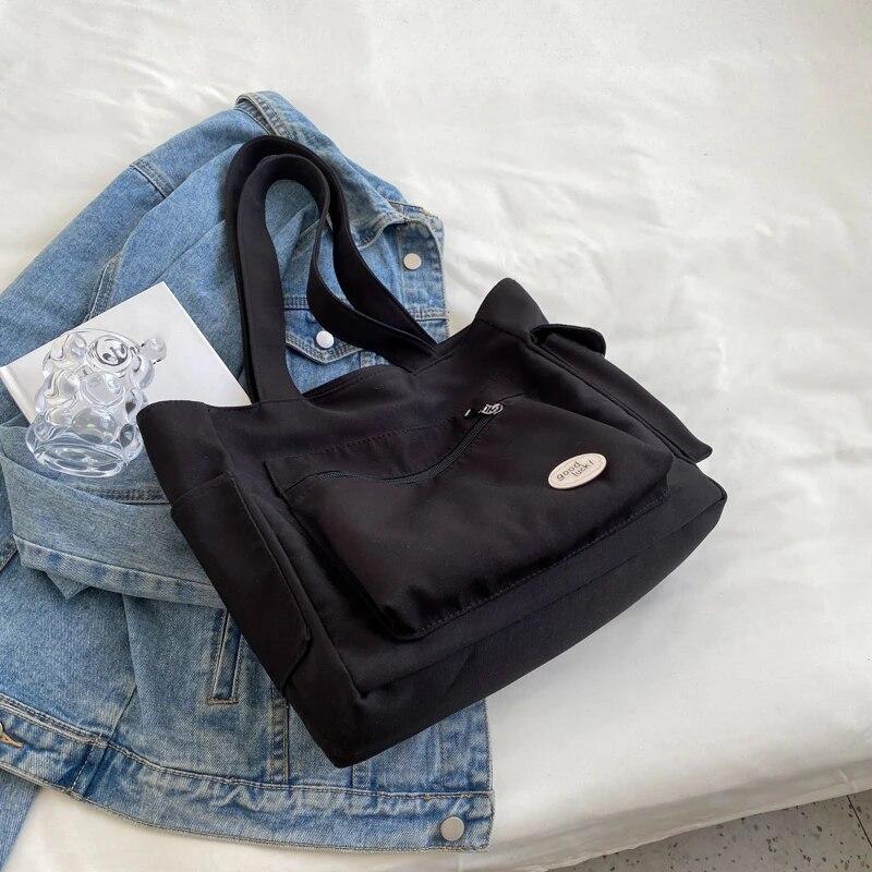 Женская сумка, большая вместительная сумка для покупок, сумка на плечо с несколькими внешними карманами, студенческая повседневная застежка-молния чёрный
Женская сумка, большая вместительная сумка для покупок, сумка на плечо с несколькими внешними карманами, студенческая повседневная застежка-молния чёрный