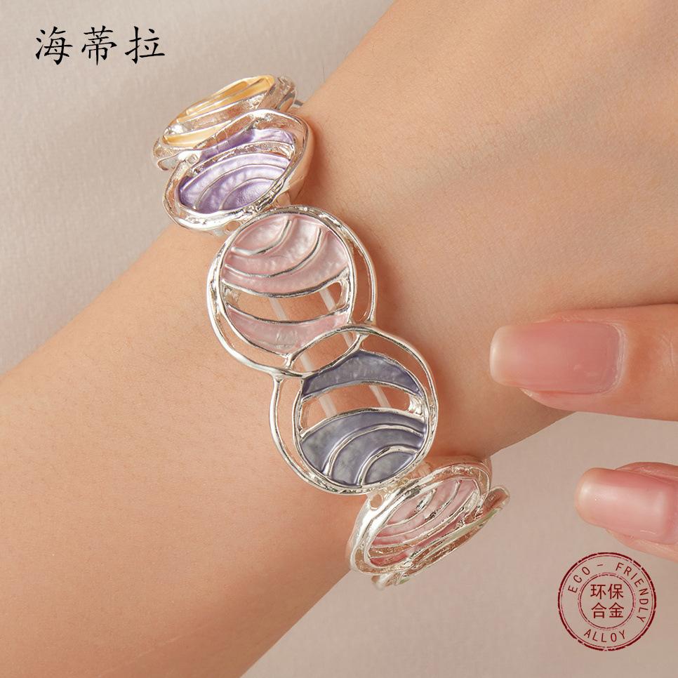 Color painting oil round striped hollow bracelet, fashionable and versatile women s high-end elastic bracelet
Color painting oil round striped hollow bracelet, fashionable and versatile women s high-end elastic bracelet