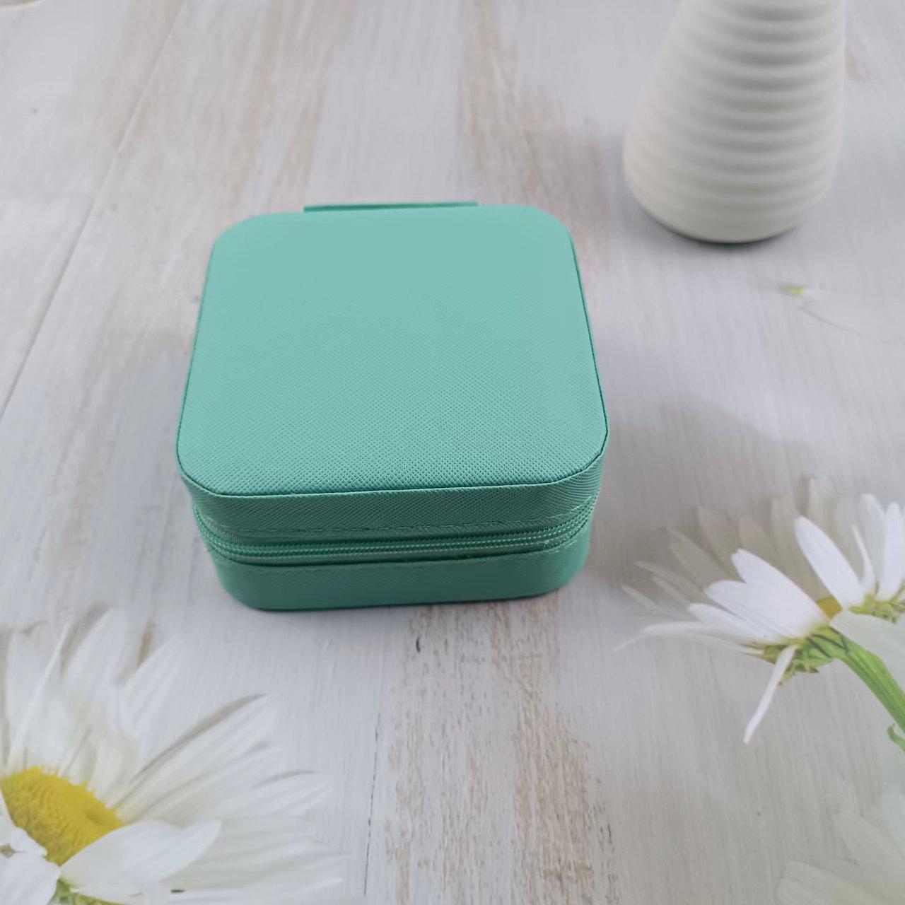 Portable Travel Jewelry Storage Box for Rings, Earrings, and Necklaces
Portable Travel Jewelry Storage Box for Rings, Earrings, and Necklaces