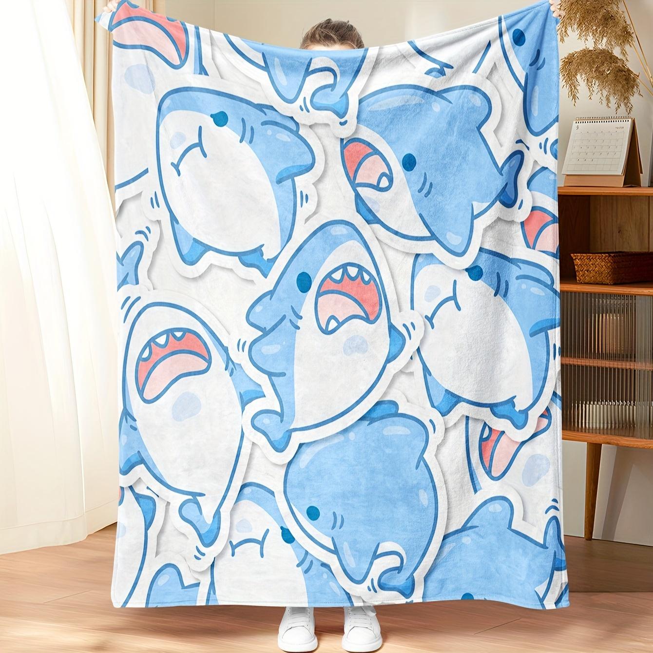 Cartoonish cute shark pattern Flannel printed blanket suitable for all seasons suitable for living room office sofa and travel 75x100cm
Cartoonish cute shark pattern Flannel printed blanket suitable for all seasons suitable for living room office sofa and travel 75x100cm
