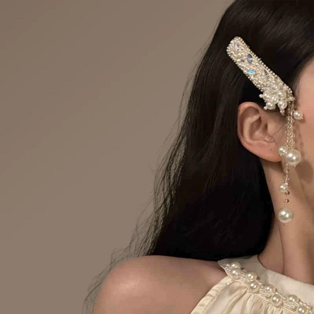 Exquisite Pearl Tassel Hair Clip Crystal Chinese Style Side Bangs Clip Women s Headdress Hair Accessory срібний
Exquisite Pearl Tassel Hair Clip Crystal Chinese Style Side Bangs Clip Women s Headdress Hair Accessory срібний