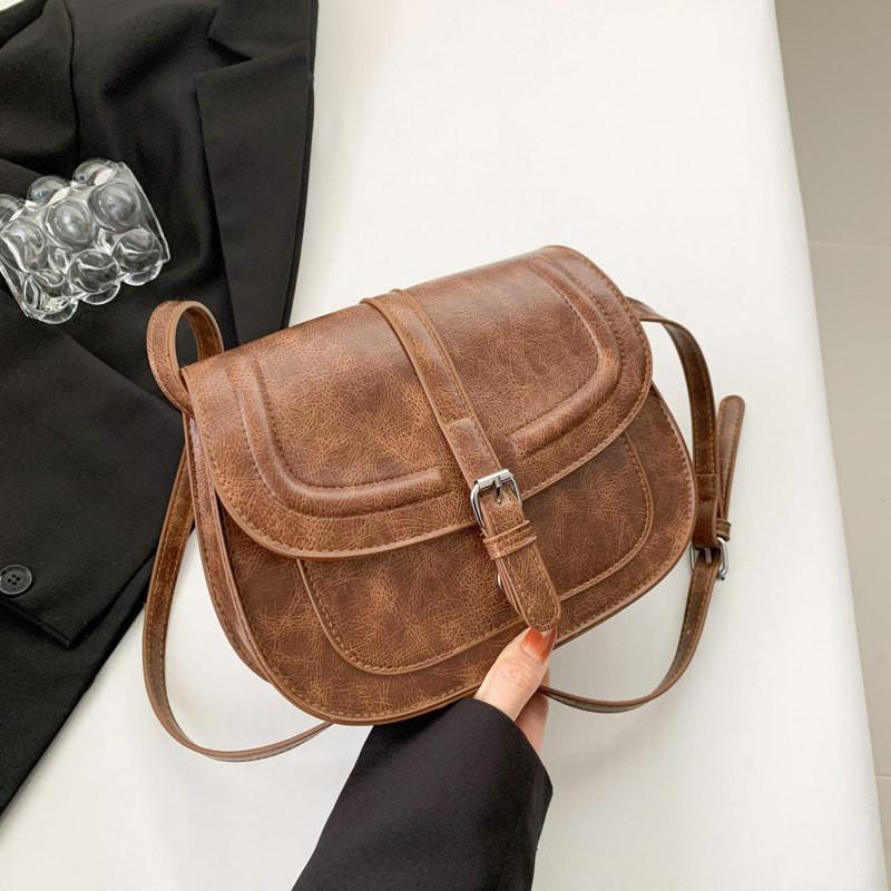 Stylish Vintage Saddle Bag 2023 Winter Fashionable Street Style Crossbody Bag Casual Chic Large Capacity Shoulder Bag коричневий
Stylish Vintage Saddle Bag 2023 Winter Fashionable Street Style Crossbody Bag Casual Chic Large Capacity Shoulder Bag коричневий