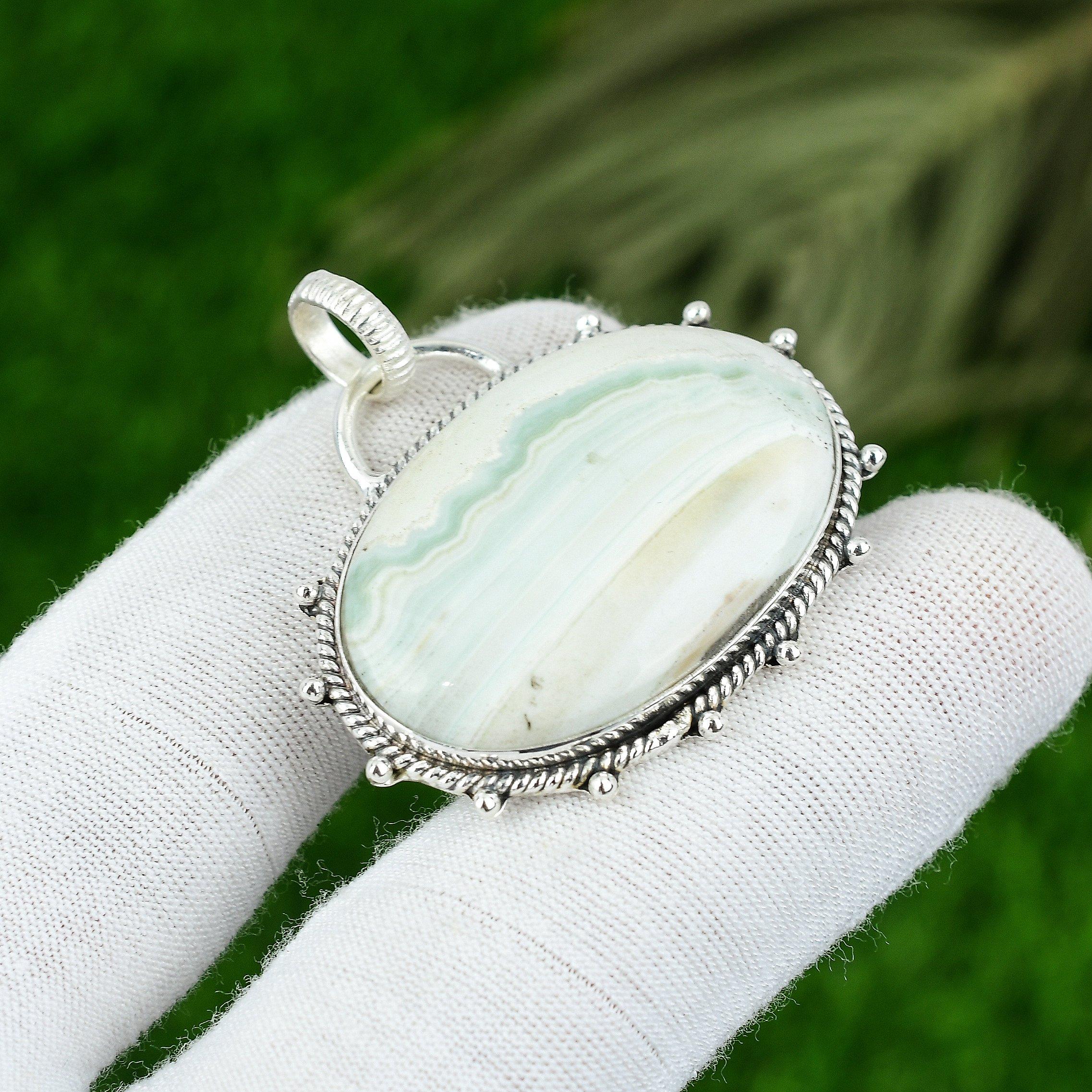 Natural Blue Rhodochrosite Gemstone 925 Sterling Silver Pendant For Women
Natural Blue Rhodochrosite Gemstone 925 Sterling Silver Pendant For Women