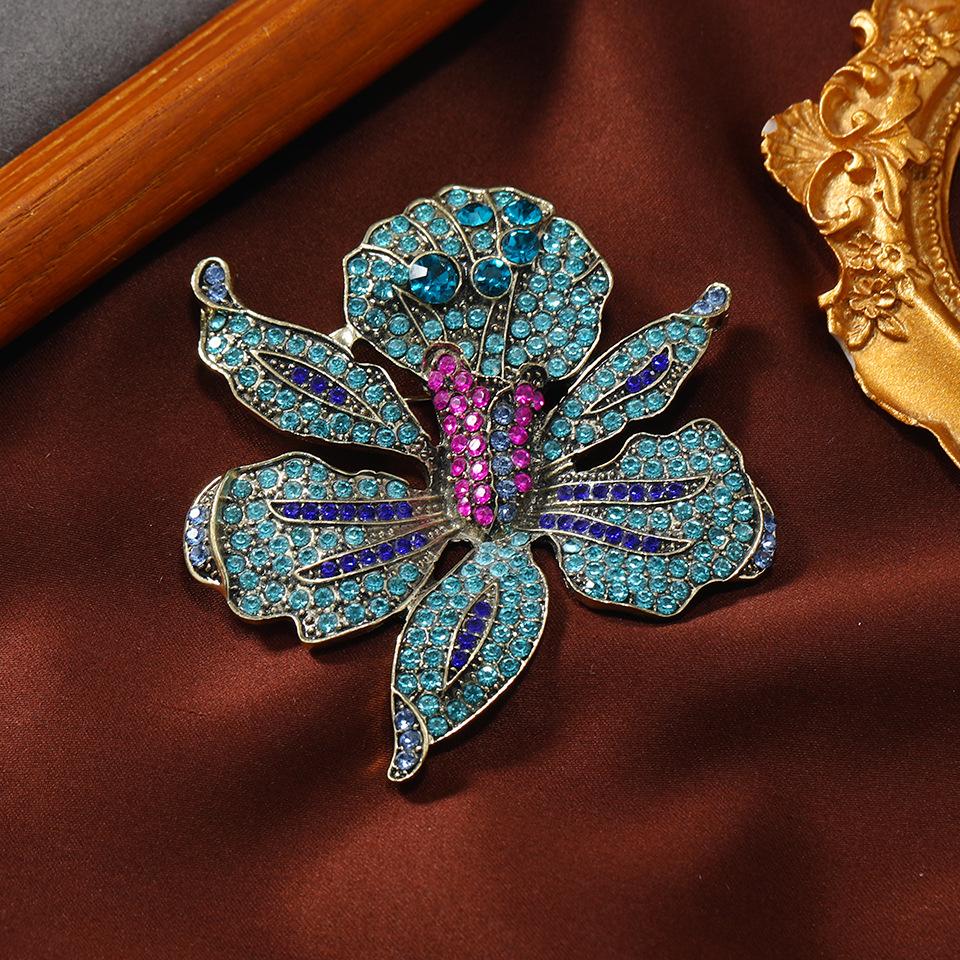 Shimk Women Fashion Vintage Luxury Shiny Rhinestone Orchid Brooches Pins Classic Flower Plant Crystal Badges Accessories
Shimk Women Fashion Vintage Luxury Shiny Rhinestone Orchid Brooches Pins Classic Flower Plant Crystal Badges Accessories