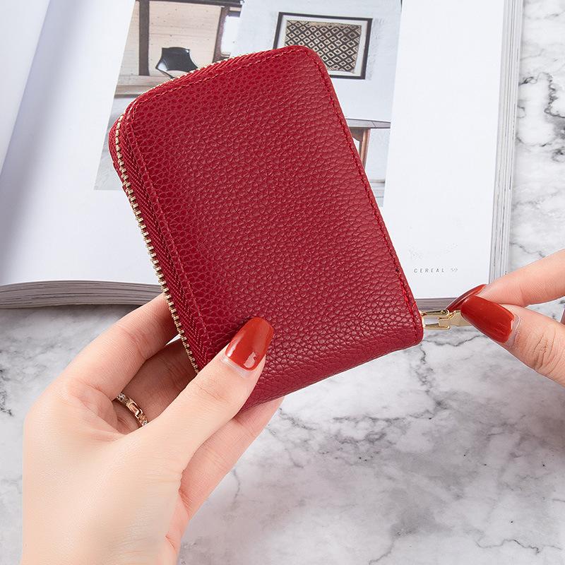 Card bag lady Korean version of the new anti-degaussing solid color driver s license mini simple multi-function compact card bag card cover woman чорний
Card bag lady Korean version of the new anti-degaussing solid color driver s license mini simple multi-function compact card bag card cover woman чорний