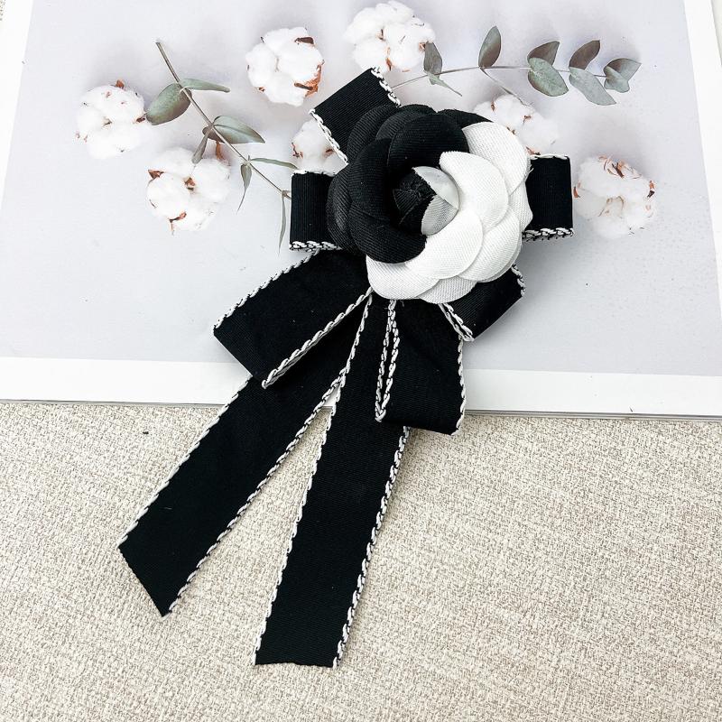 Элегантная брошь-бабочка с черной камелией, французская ретро-корсаж, в стиле колледжа, булавки на воротник пиджака/рубашки, траурная брошь, ювелирное украшение для галстука чёрный
Элегантная брошь-бабочка с черной камелией, французская ретро-корсаж, в стиле колледжа, булавки на воротник пиджака/рубашки, траурная брошь, ювелирное украшение для галстука чёрный