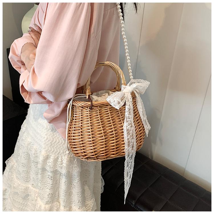 Seaside vacation beach straw bag women s new rattan handbag pearl chain crossbody weaving
Seaside vacation beach straw bag women s new rattan handbag pearl chain crossbody weaving