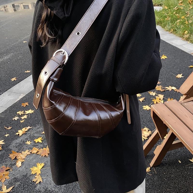 Сумка премиум-текстуры женская большой вместимости 2025 новая осенне-зимняя ретро сумка через плечо, сумка-мессенджер, нишевая сумка-пельмень для通勤 темно-коричневого
Сумка премиум-текстуры женская большой вместимости 2025 новая осенне-зимняя ретро сумка через плечо, сумка-мессенджер, нишевая сумка-пельмень для通勤 темно-коричневого