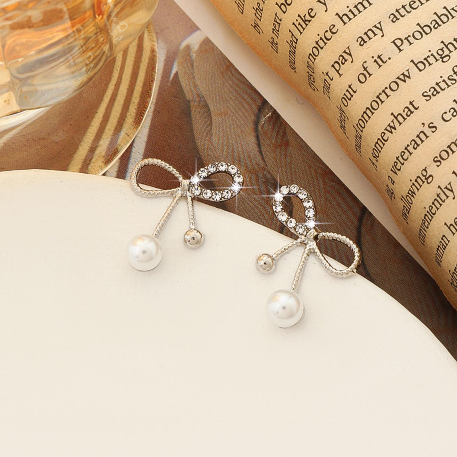 Bowknot Stud Earrings with Embedded Crystals Lightweight Metal Alloy Fashion Jewelry for Women and Girls
Bowknot Stud Earrings with Embedded Crystals Lightweight Metal Alloy Fashion Jewelry for Women and Girls