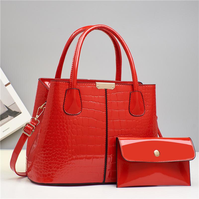 Fashion Crocodile Pattern Mother and Daughter Bag Large Capacity Bright Leather Waterproof Multi-compartment Fine Texture Handbag Shoulder Bag червоний
Fashion Crocodile Pattern Mother and Daughter Bag Large Capacity Bright Leather Waterproof Multi-compartment Fine Texture Handbag Shoulder Bag червоний