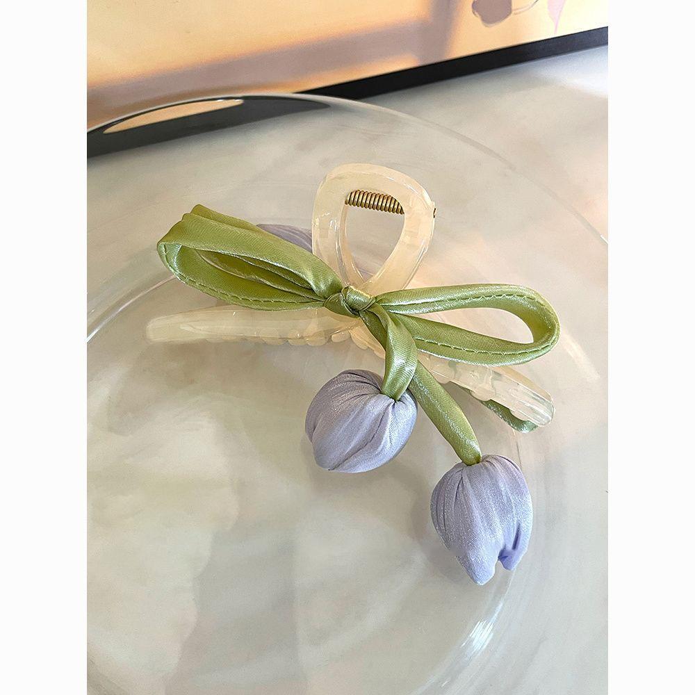 Fabric mesh bow tulip fringed hairpin sweet small fresh simple grab clip niche design headdress
Fabric mesh bow tulip fringed hairpin sweet small fresh simple grab clip niche design headdress