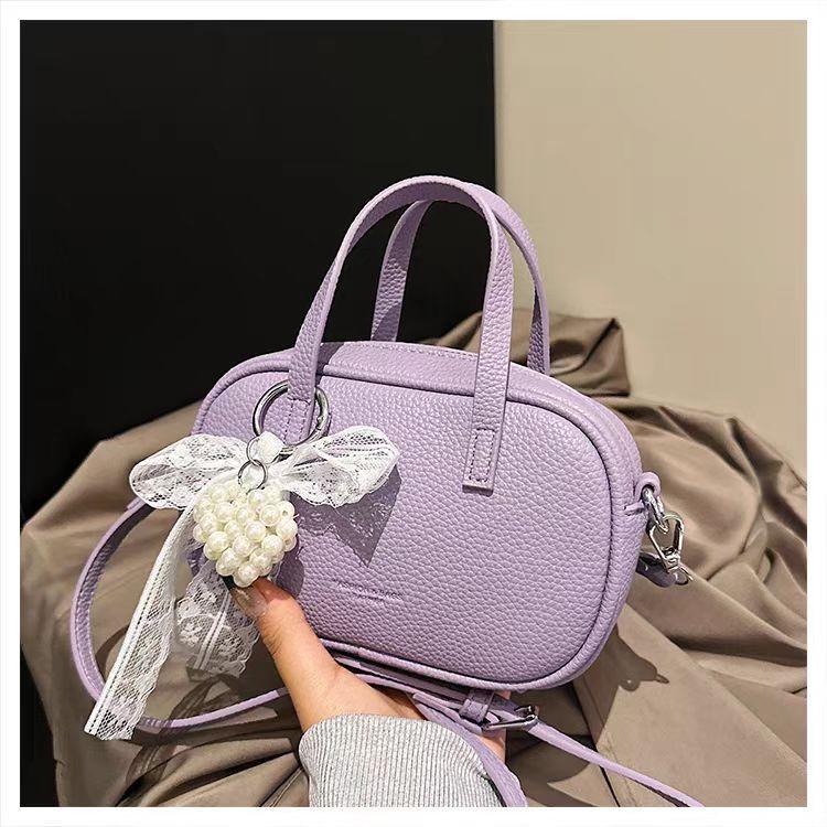 Korean Style Simple Niche Portable Commuter Bag Women s Fashionable Cross-section Small Square Foreign-style Shoulder 18x6x12 single package фіолетовий
Korean Style Simple Niche Portable Commuter Bag Women s Fashionable Cross-section Small Square Foreign-style Shoulder 18x6x12 single package фіолетовий