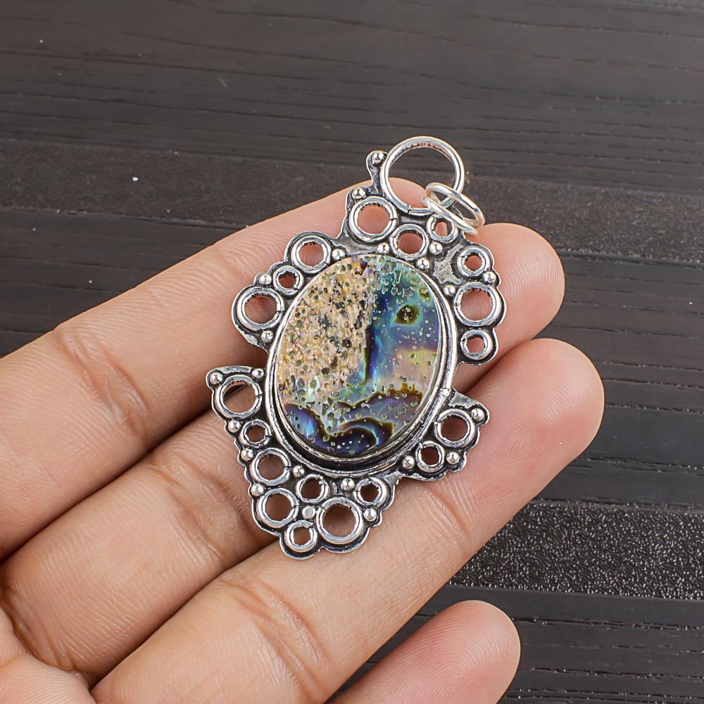 Natural Abalone Shell Gemstone 925 Sterling Silver Jewelry Designer Pendant 2.1 AJP-2451
Natural Abalone Shell Gemstone 925 Sterling Silver Jewelry Designer Pendant 2.1 AJP-2451