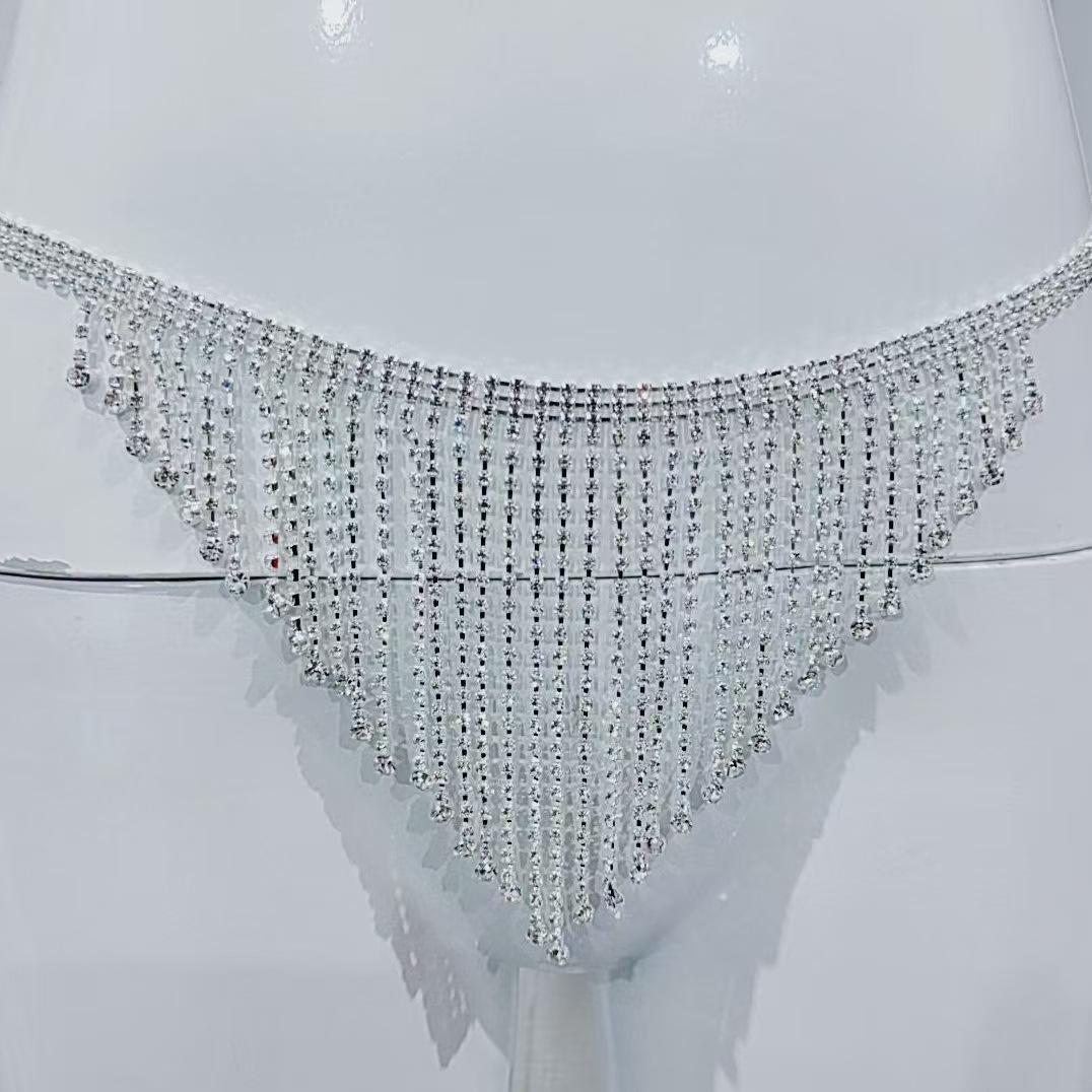 Fashion full diamond fringe underwear waist chain, nightclub party rhinestones, sexy body chain, women s sparkling diamond clothing срібний
Fashion full diamond fringe underwear waist chain, nightclub party rhinestones, sexy body chain, women s sparkling diamond clothing срібний