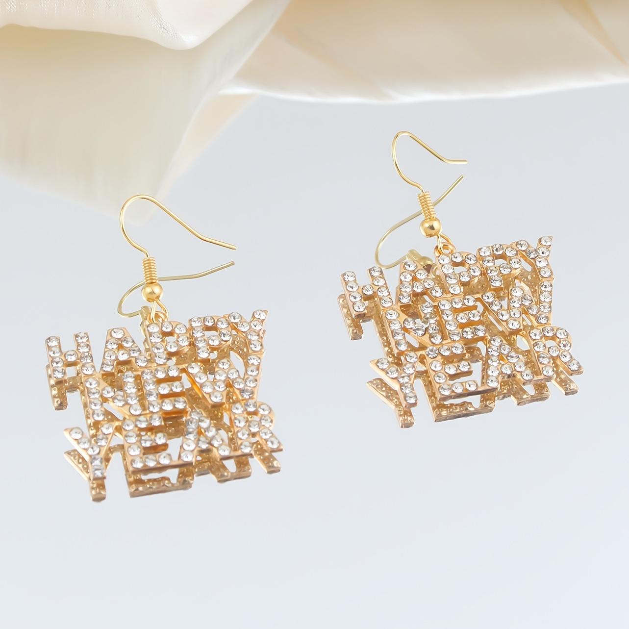 Simple and environmentally friendly alloy diamond-encrusted happy new year English alphabet earrings New Year s ear jewelry золотий
Simple and environmentally friendly alloy diamond-encrusted happy new year English alphabet earrings New Year s ear jewelry золотий