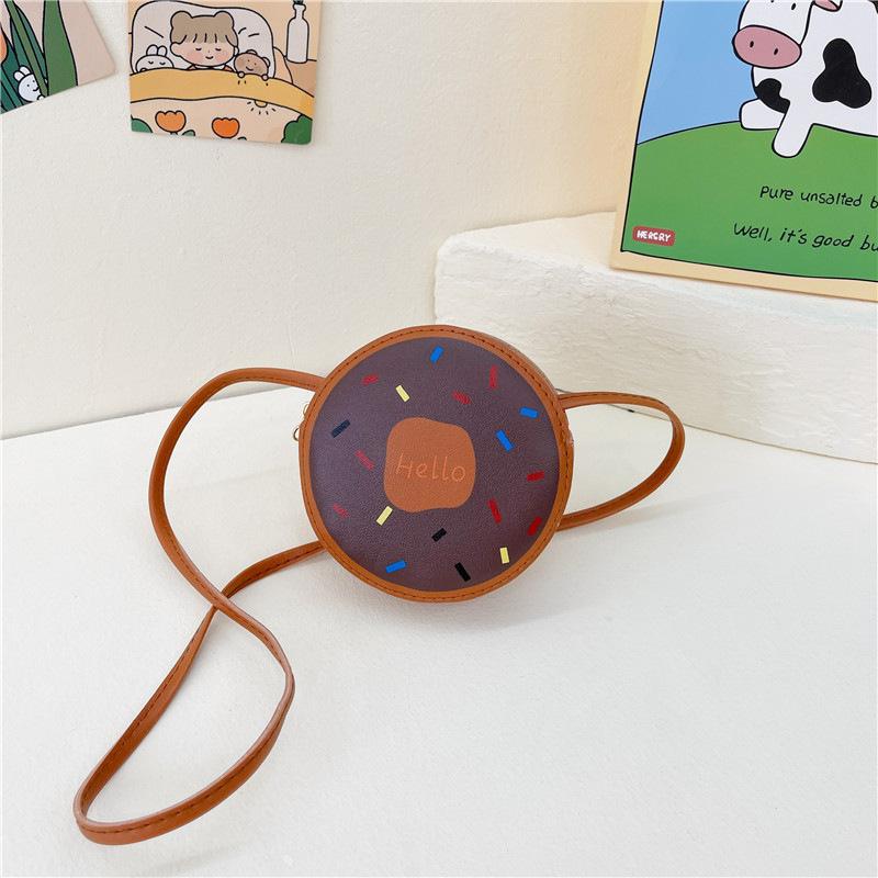 Милая маленькая сумочка для девочки 2025 новая милая детская сумка-мессенджер для мелочи мультяшная сумка на плечо в виде пончика коричневый
Милая маленькая сумочка для девочки 2025 новая милая детская сумка-мессенджер для мелочи мультяшная сумка на плечо в виде пончика коричневый