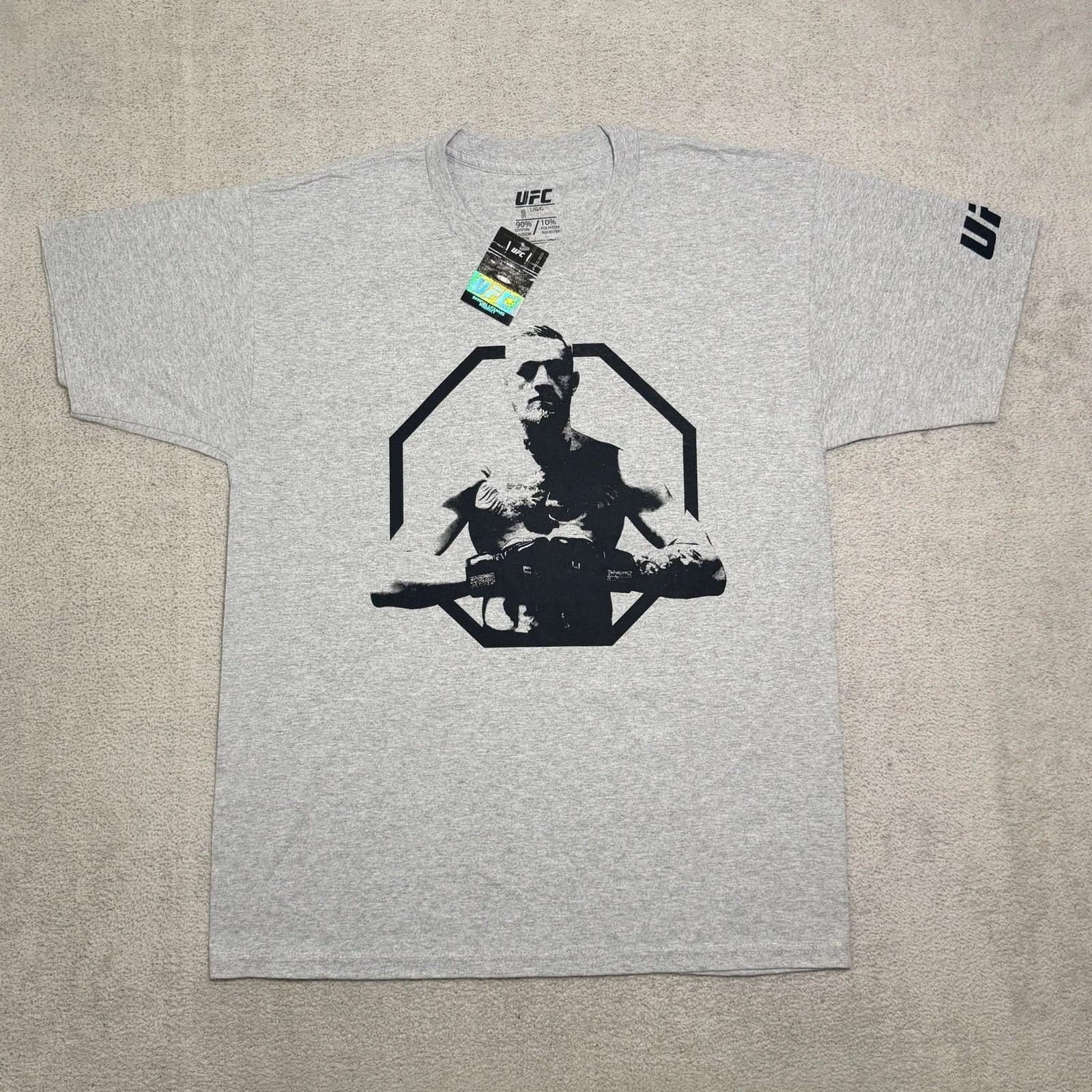 UFC Connor McGregor T Shirt Adult Large Gray Short Sleeve Graphic Print NEW XL
UFC Connor McGregor T Shirt Adult Large Gray Short Sleeve Graphic Print NEW XL