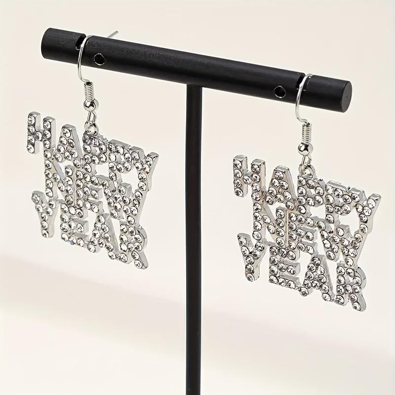 Simple and environmentally friendly alloy diamond-encrusted happy new year English alphabet earrings New Year s ear jewelry серебряный
Simple and environmentally friendly alloy diamond-encrusted happy new year English alphabet earrings New Year s ear jewelry серебряный