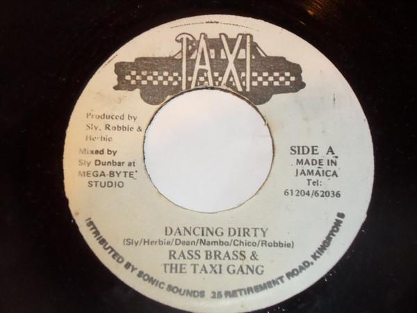 7-дюймовая пластинка RASS BRASS & THE TAXI GANG - Dancing Dirty НИКАКОЙ Taxi Ямайский Регги, Ска и Даб Б/У
7-дюймовая пластинка RASS BRASS & THE TAXI GANG - Dancing Dirty НИКАКОЙ Taxi Ямайский Регги, Ска и Даб Б/У