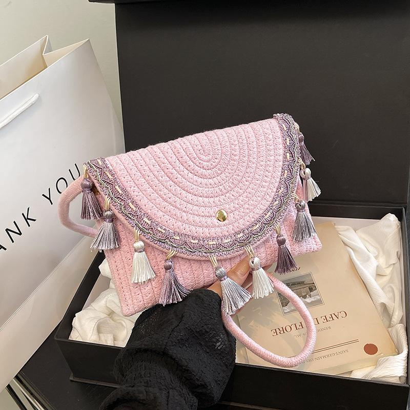 Multi Colored Tassel Woven Bag Fashionable Casual Texture Hand-held Bag Travel Seaside Crossbody Bag Women s Small Square Bag KTB 22x3x14cm рожевий
Multi Colored Tassel Woven Bag Fashionable Casual Texture Hand-held Bag Travel Seaside Crossbody Bag Women s Small Square Bag KTB 22x3x14cm рожевий