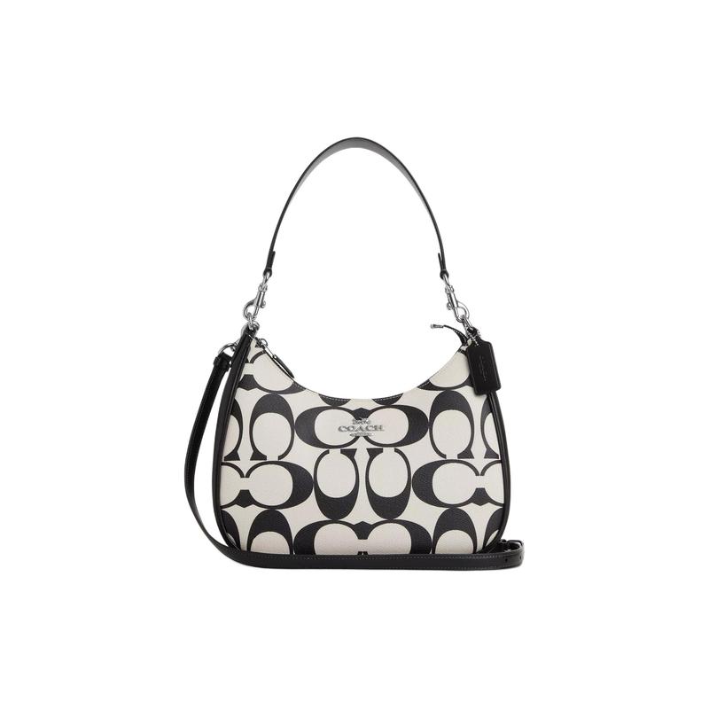 COACH shoulder bag Teri 29 brand logo hardware buckle classic presbyopic zipper closure canvas and leather armpit hand large size women s silver срібний
COACH shoulder bag Teri 29 brand logo hardware buckle classic presbyopic zipper closure canvas and leather armpit hand large size women s silver срібний