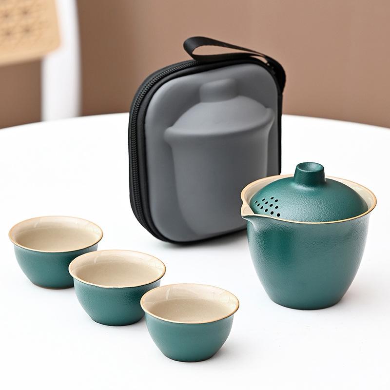 Black pottery Kuaike cup, one cover bowl, three cups ceramic travel tea set, portable outdoor souvenir set, business gift.
Black pottery Kuaike cup, one cover bowl, three cups ceramic travel tea set, portable outdoor souvenir set, business gift.