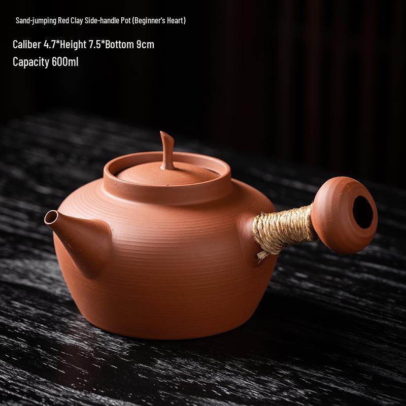 Handmade Red Clay Kettle with Side Handle and Jump Lid for Tea Brewing and Boiling on Electric Ceramic Stove
Handmade Red Clay Kettle with Side Handle and Jump Lid for Tea Brewing and Boiling on Electric Ceramic Stove